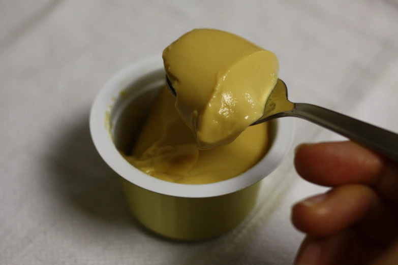 a close up of a spoon in some type of liquid