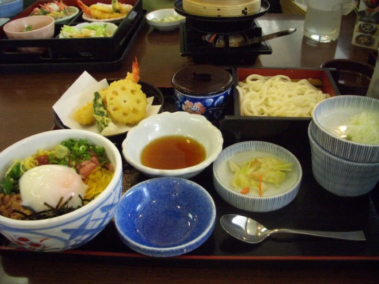 a variety of food is laying out on a table