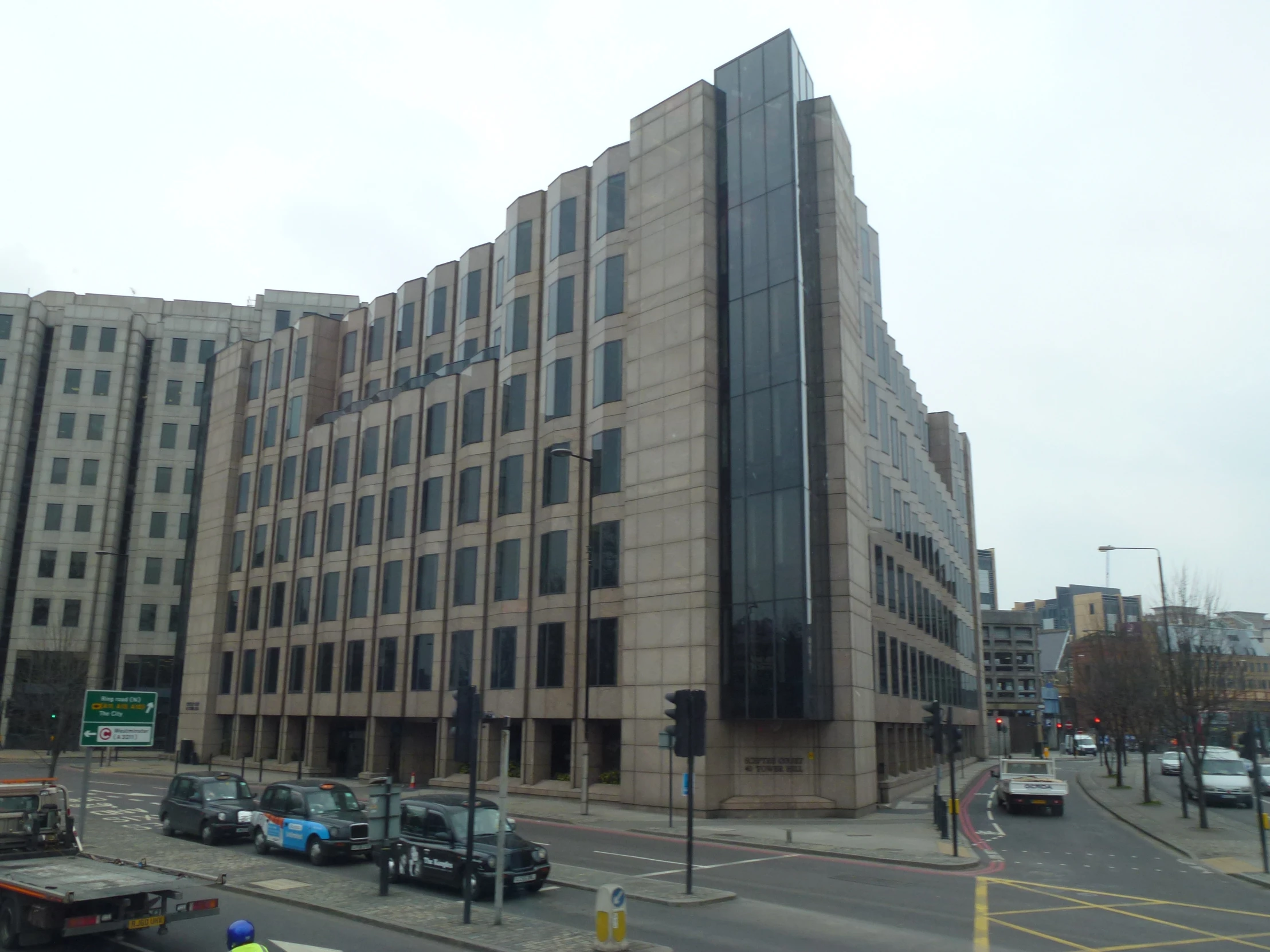 there is a huge building that has been constructed with modern glass windows