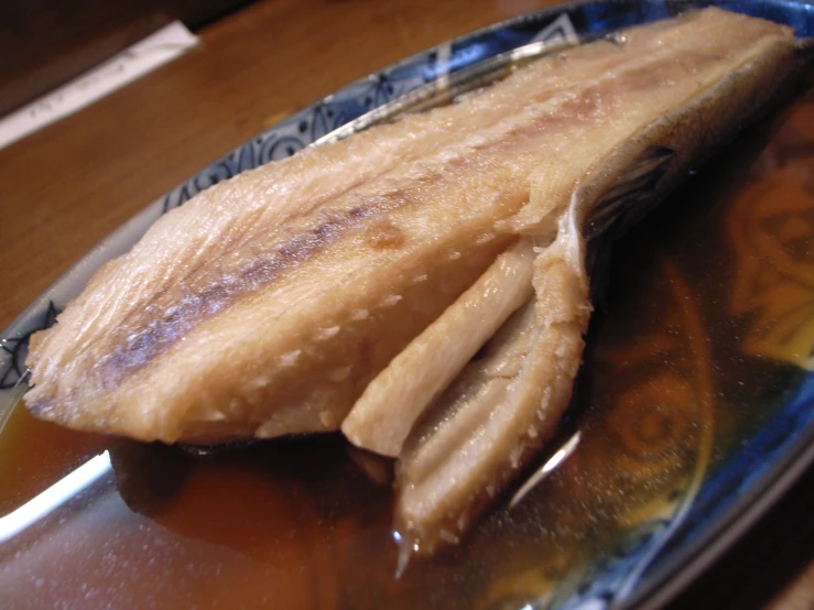 a close up of a plate with food on a table