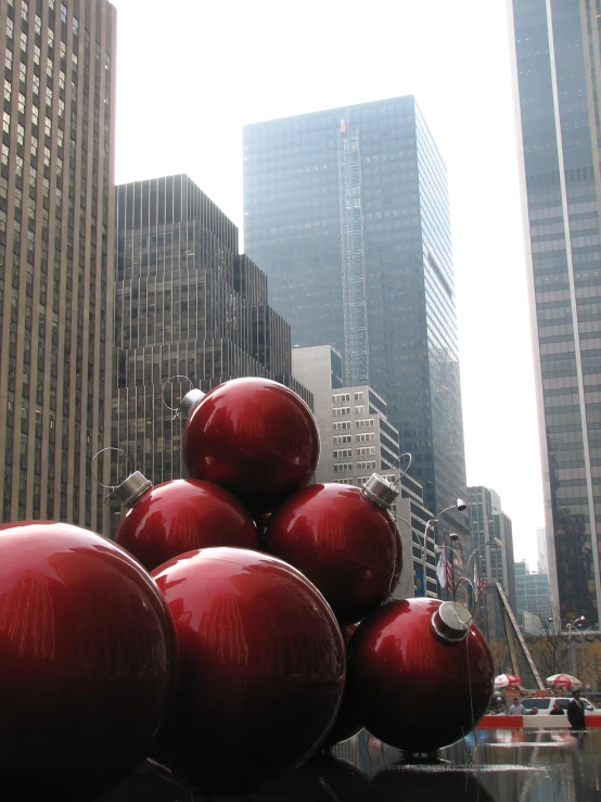 red ornaments with building in the background