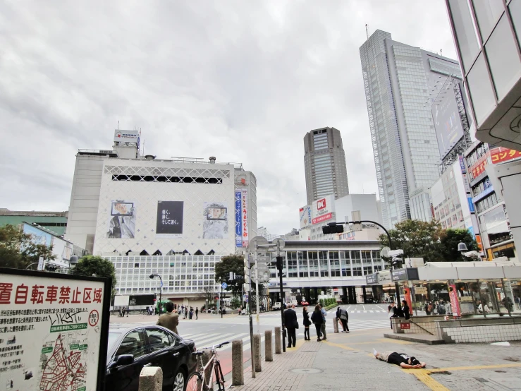 a city street with signs and buildings in it