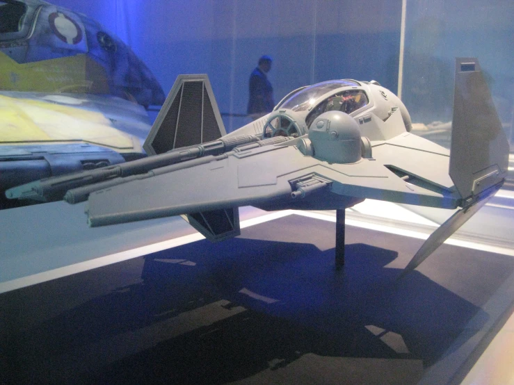 a model fighter jet that is on display