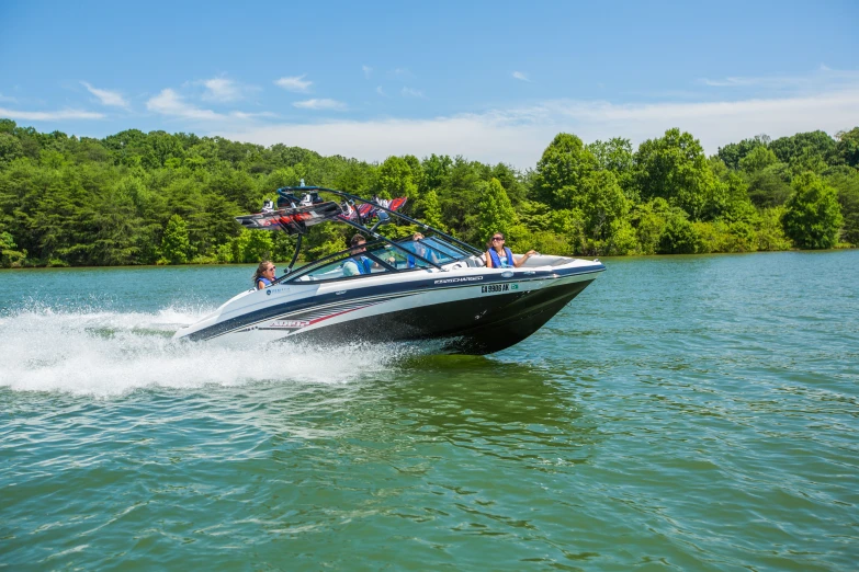 a speed boat is speeding across the water