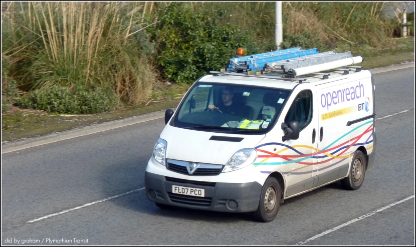 an image of a van driving down the road