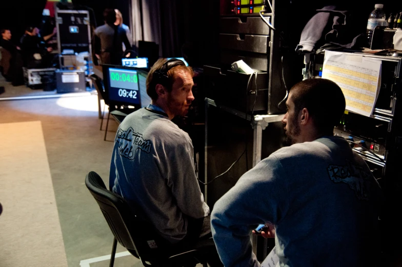 two men playing a video game with the nintendo wii