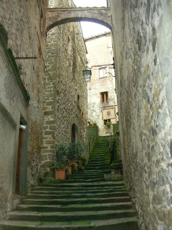 old stone building with a set of steps leading up to them