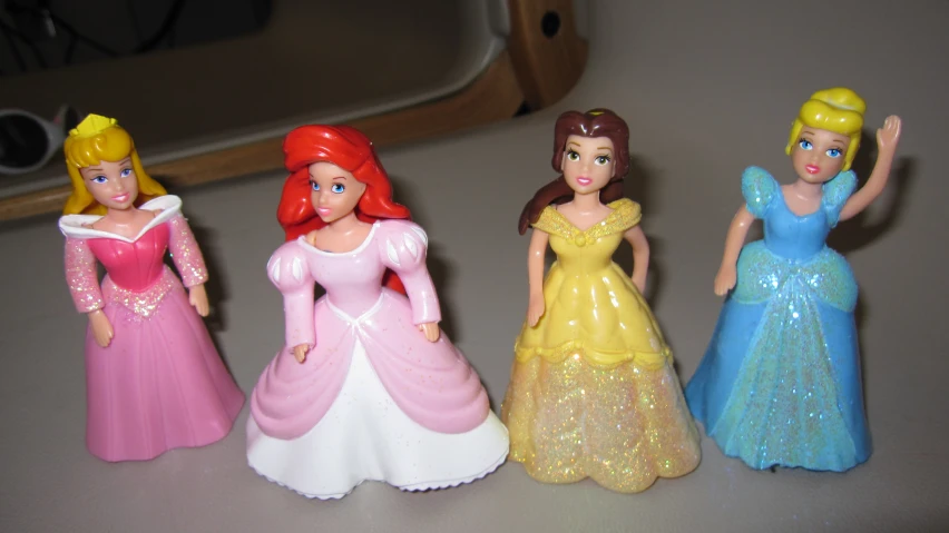 five little princesses in various pastel gowns and hair