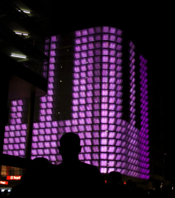 a large building that is lit up with light