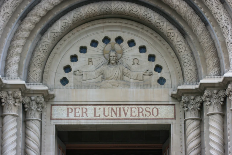 the entrance to an old building with an arch