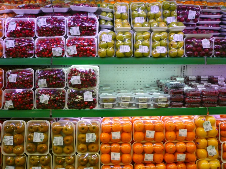 produce and oranges displayed on display at a grocery store