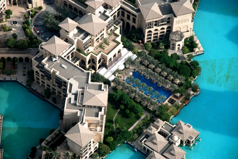 a aerial s of a beautiful resort building surrounded by water