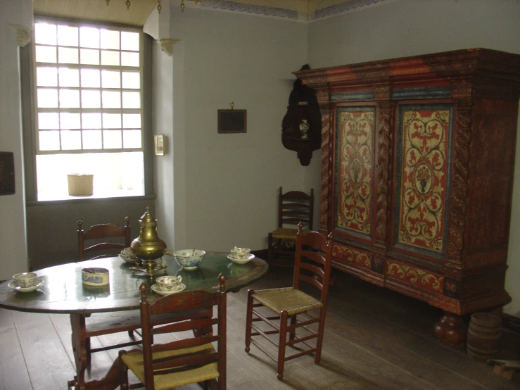 a room with furniture and a wooden table