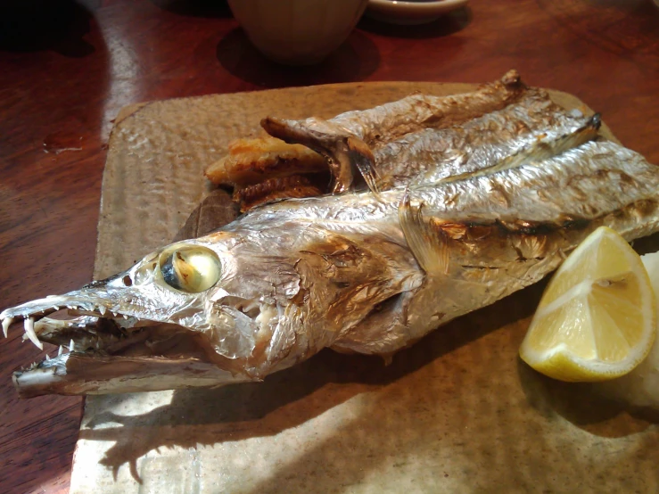 a fish is cut up and sitting on a table