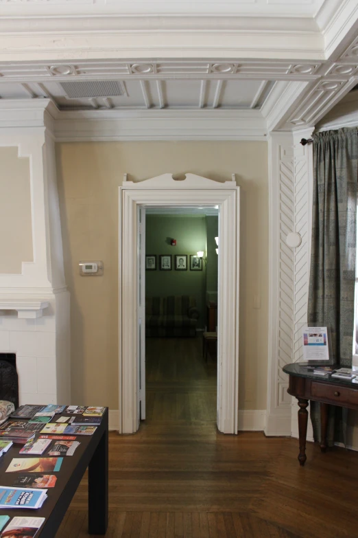 a wooden floor with pictures sitting on top of it