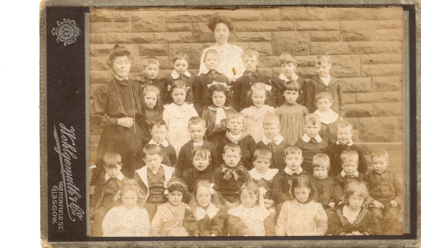 a group of children pose for a picture