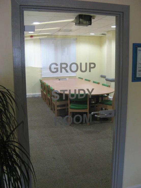 a group study room seen through an opening door