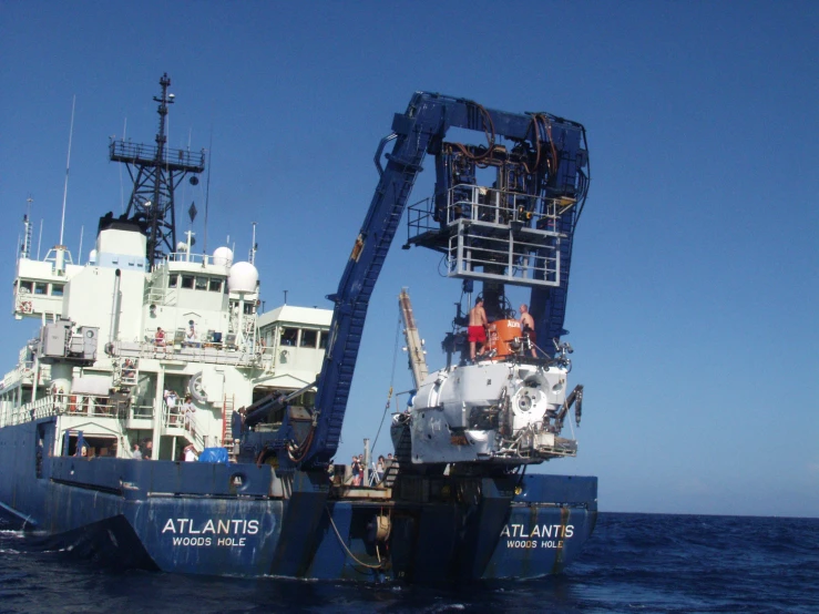 a large white ship in the middle of the ocean