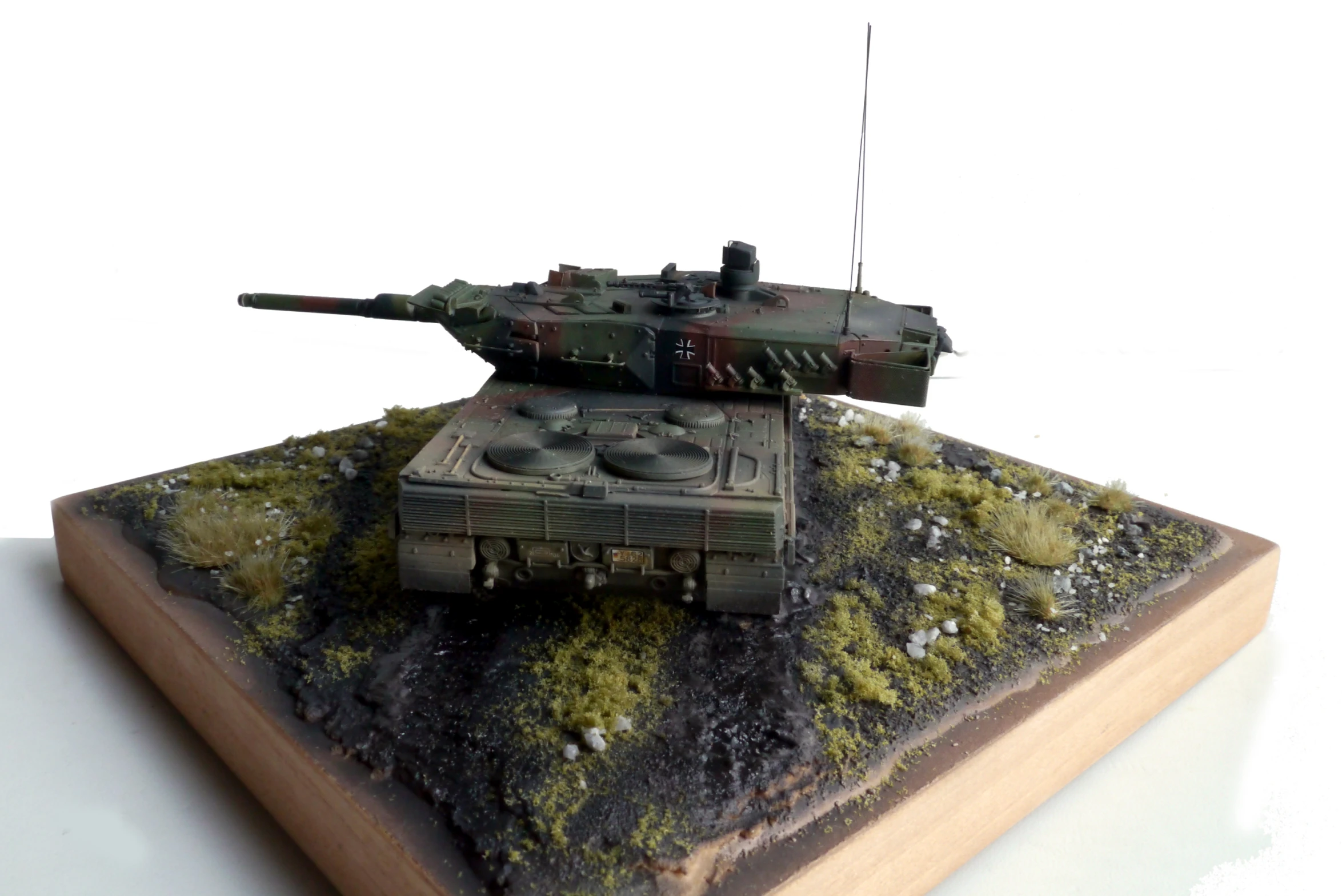 tank models on display with a white background