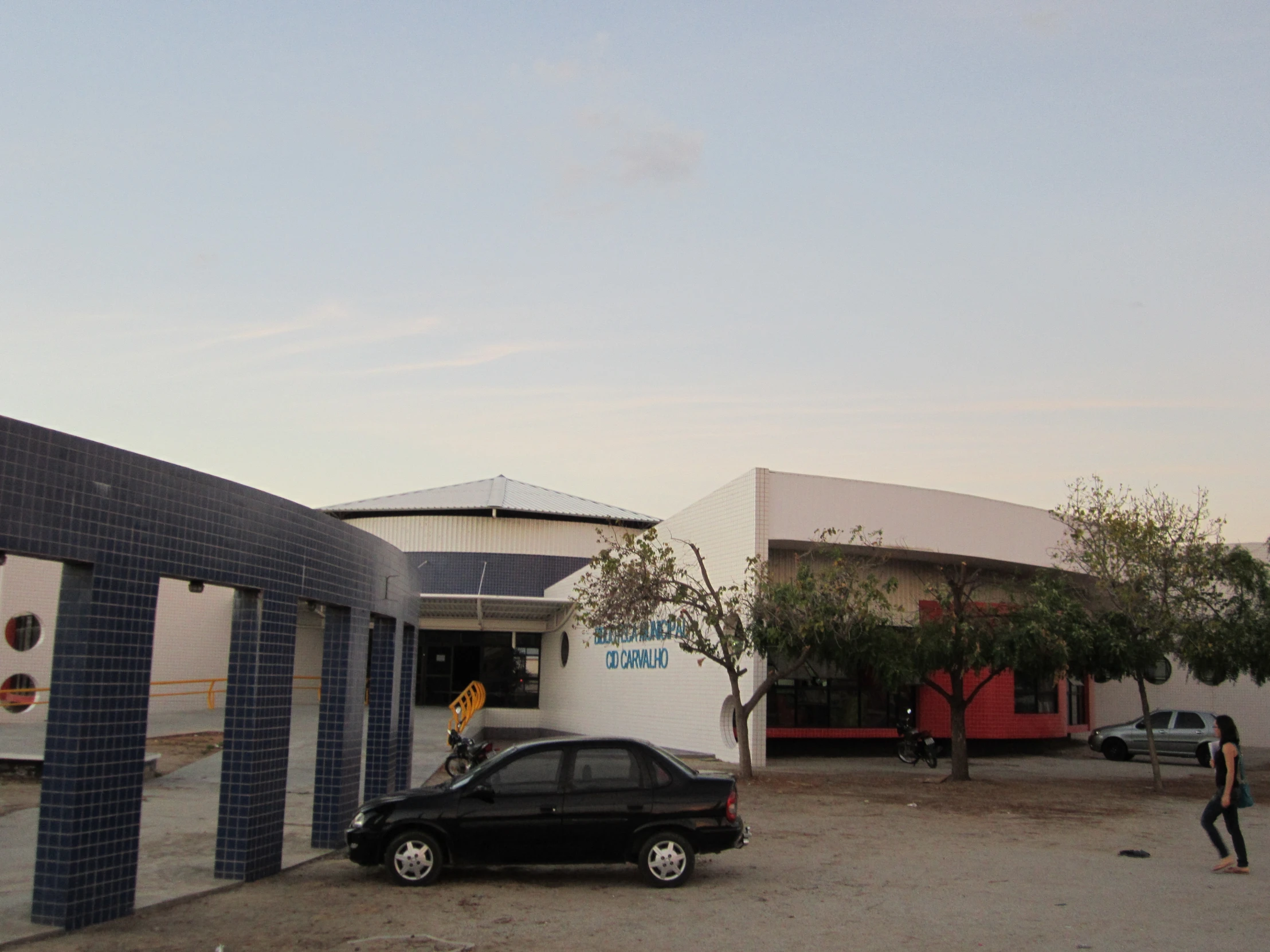 a car parked at the entrance of a garage