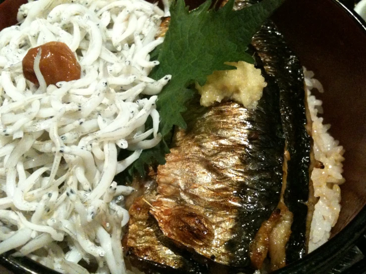 an asian dish of steamed noodles and meat