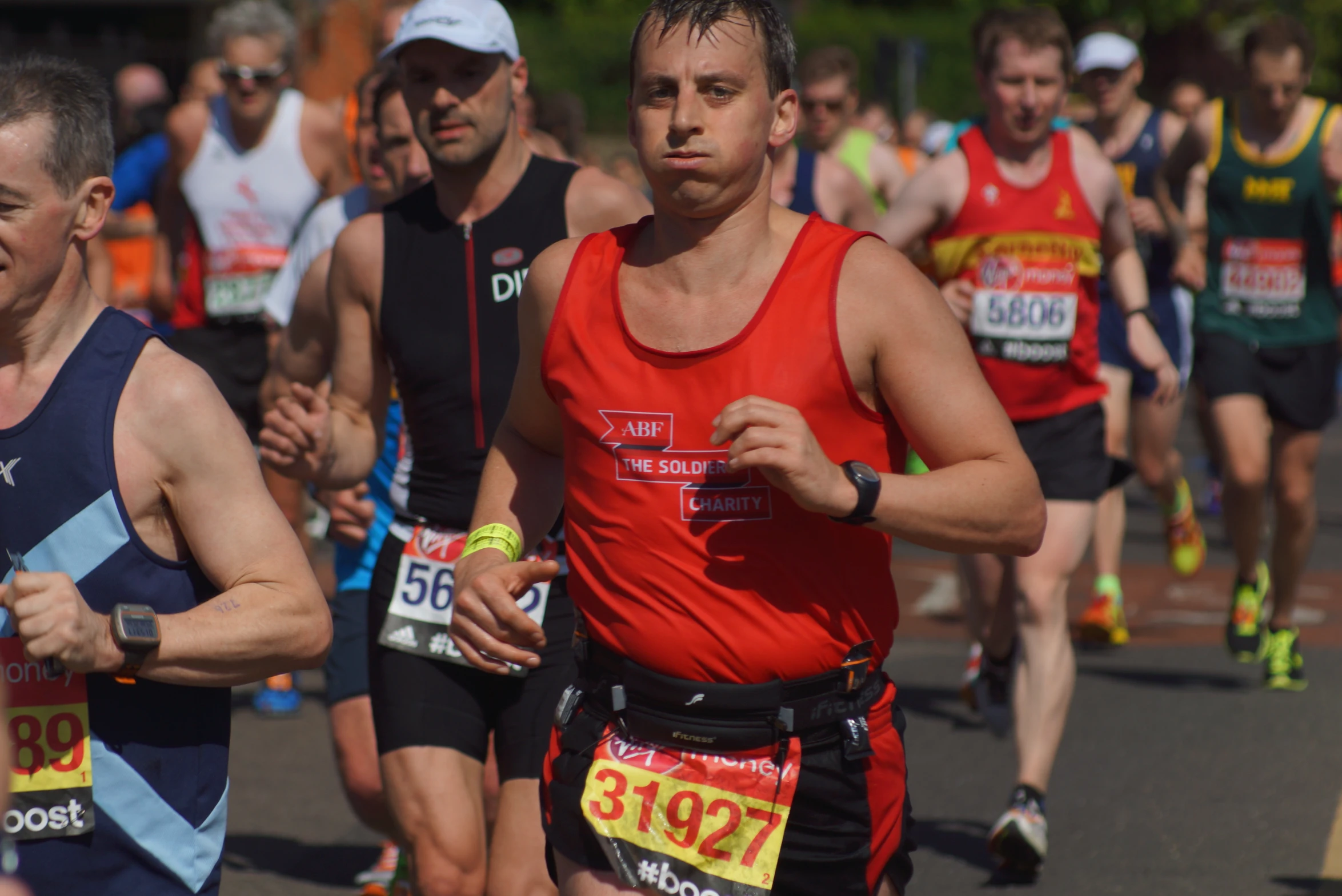 the runner is in the front with his name tags on