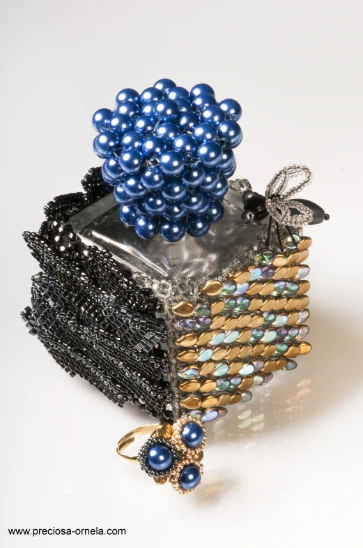 a black, gold and silver bead case