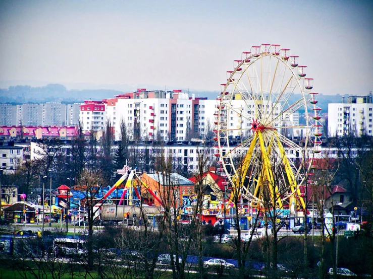 a ferris wheel and a colorful carnival park