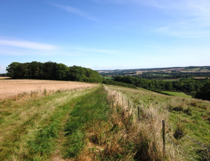 a long path is coming up to the side of a hill