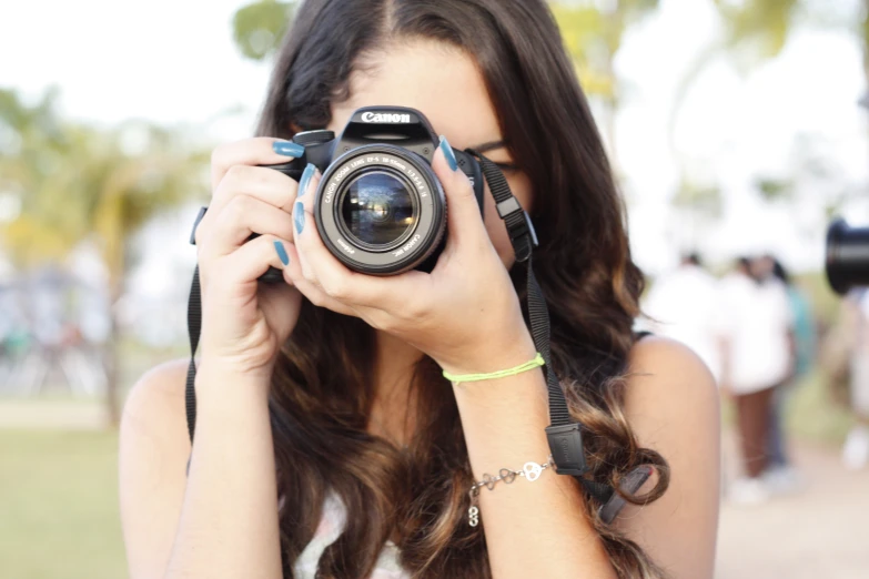 a woman taking a po with a camera