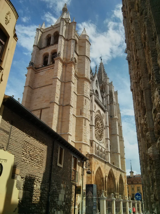 an old cathedral sits in a brick city