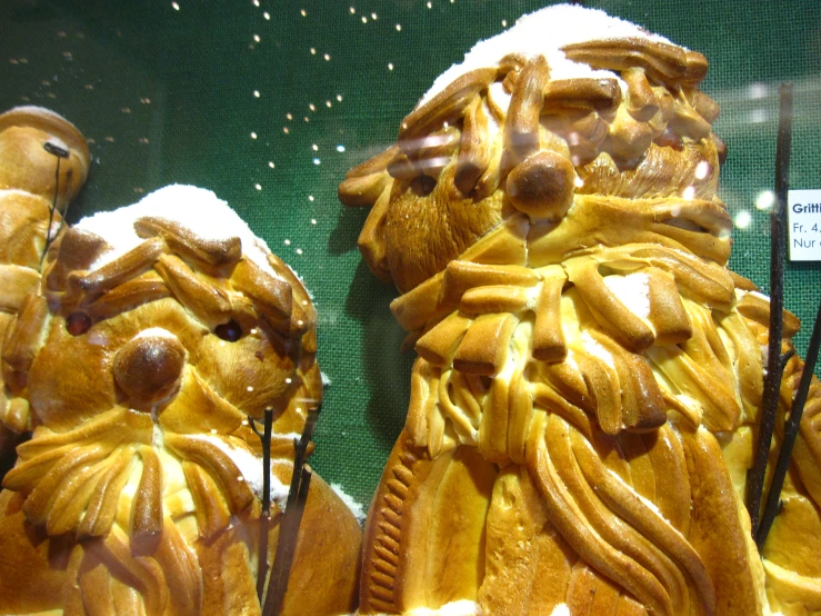 this is a pair of lion statues, gold