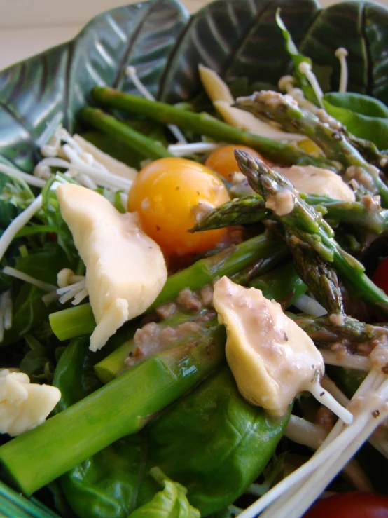 a plate full of green and white vegetables