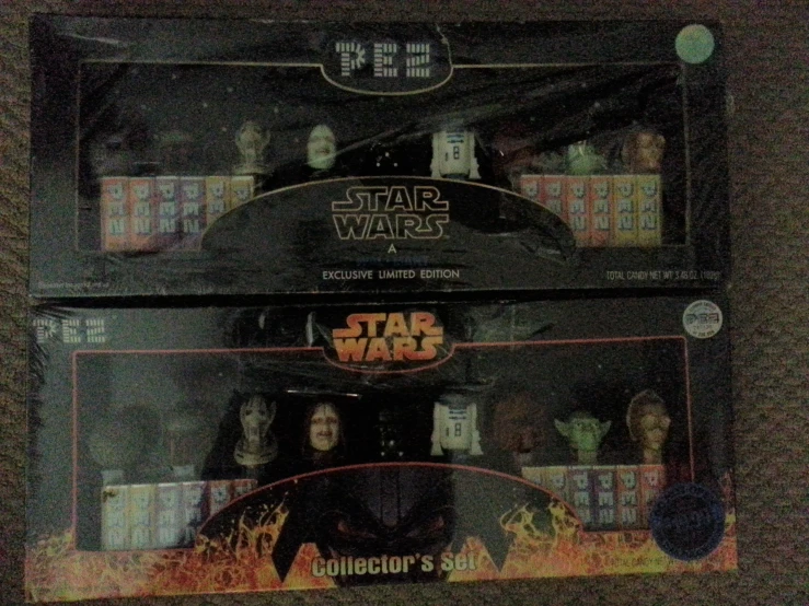 two display cases each have a star wars action figure on the bottom and sides