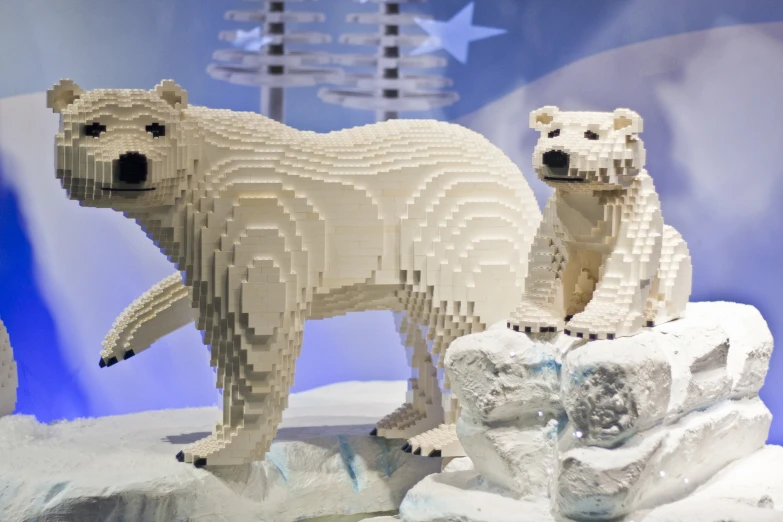 an image of two polar bears in a fake arctic setting