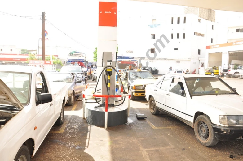 two cars are plugged in an electric fuel pump