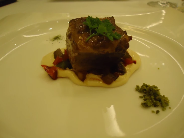 square beef meal, served with cream sauce and parsley