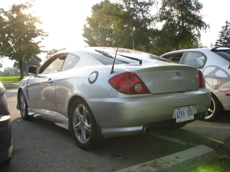 an image of a silver car thats parked