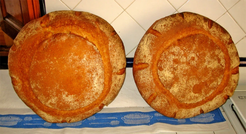 a bread with two sections on a blue towel on top