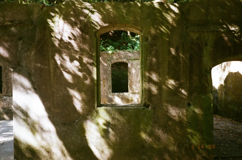 a stone wall with some small windows in it