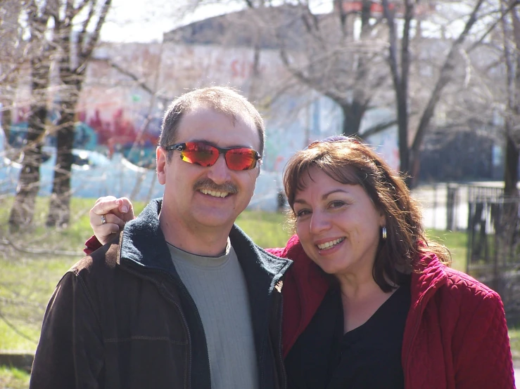 a man and woman with their arms around each other