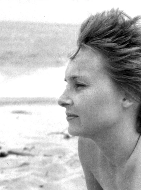 black and white pograph of a woman staring away