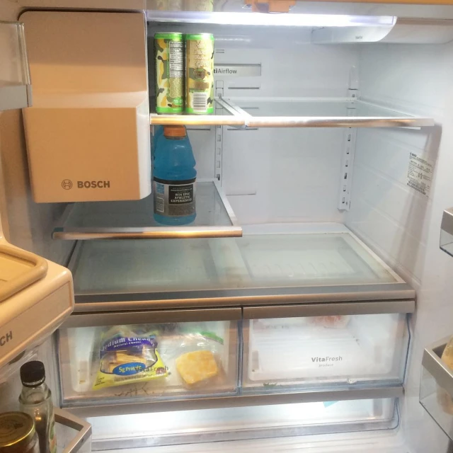a fridge is open with the door closed
