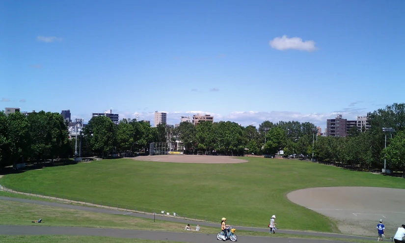 people are out walking and taking pos on a clear day