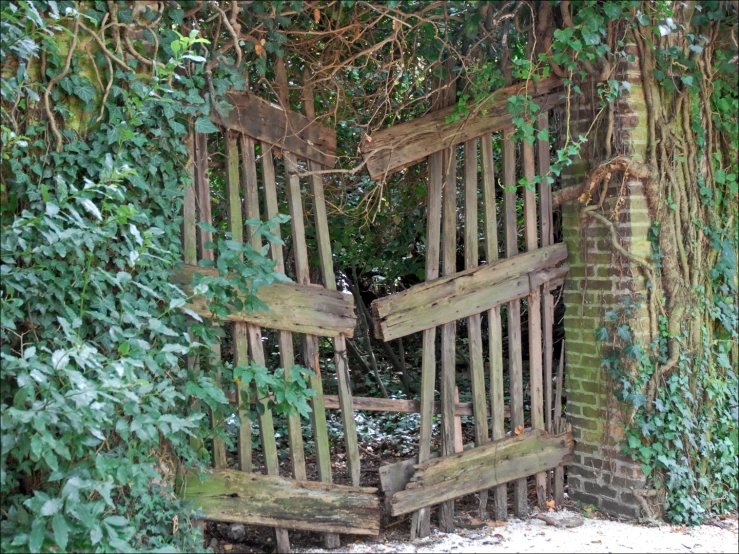 the gate is made out of two pieces of wooden planks