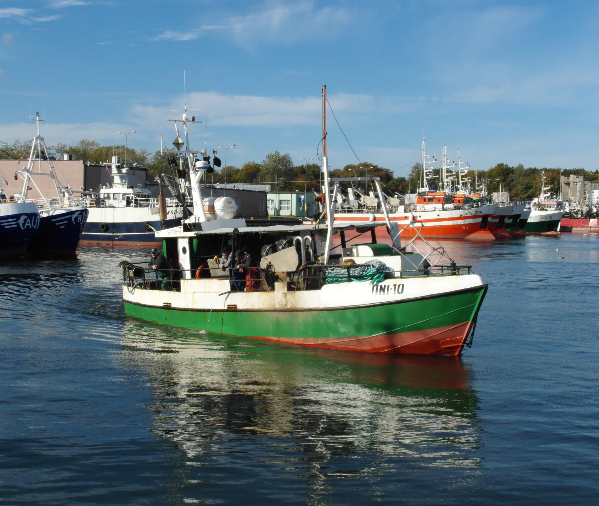 a couple of boats are sitting in the water