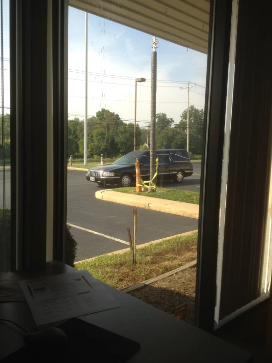 a view of cars from outside a window