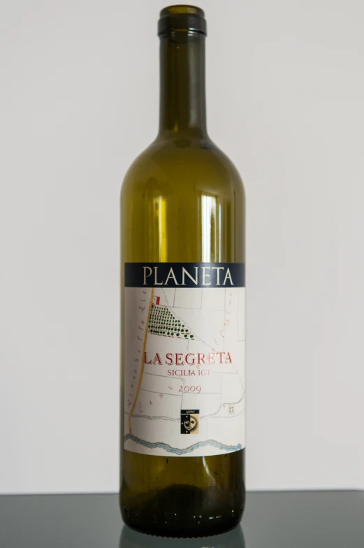 a wine bottle with a label is displayed