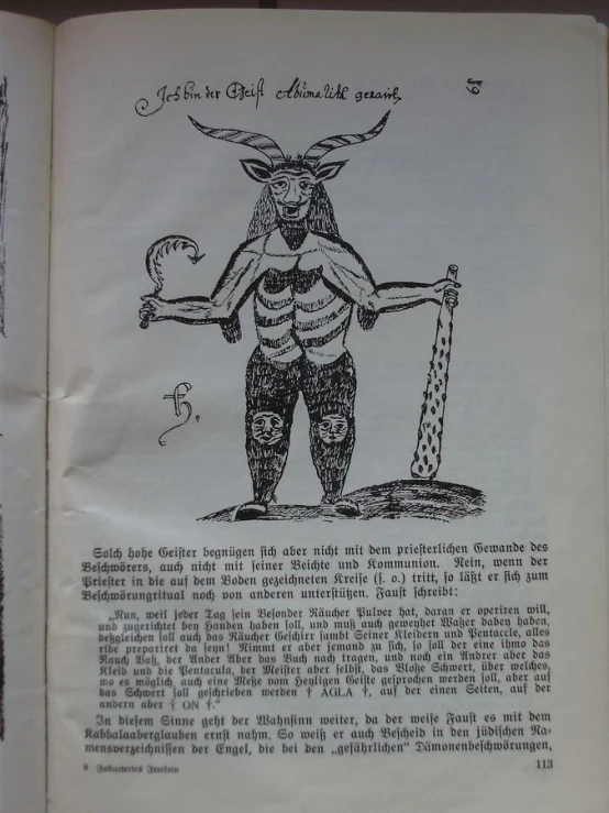 a page with an ancient drawing and caption about the devil