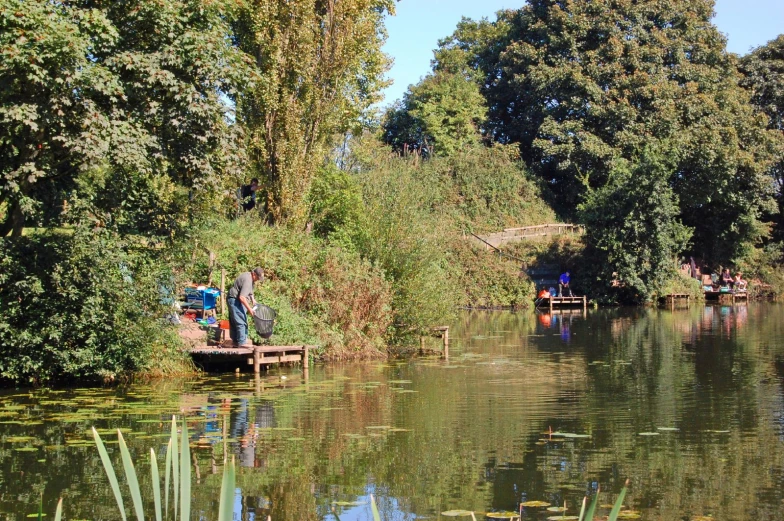 a couple of people that are on some water